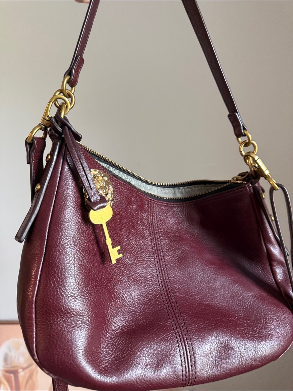 Fossil Burgundy Pebbled Leather Hobo with Gold Hardware